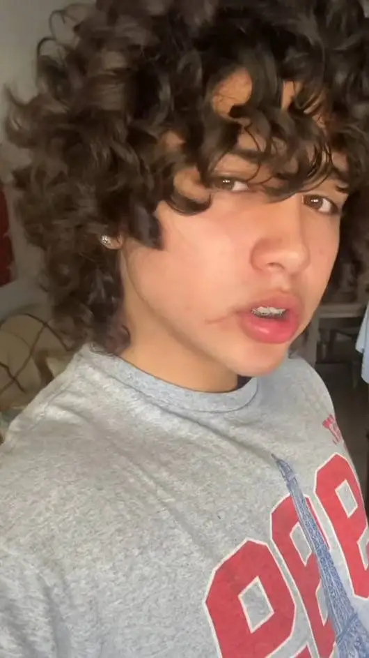 ai character: Ethan Garcia  background