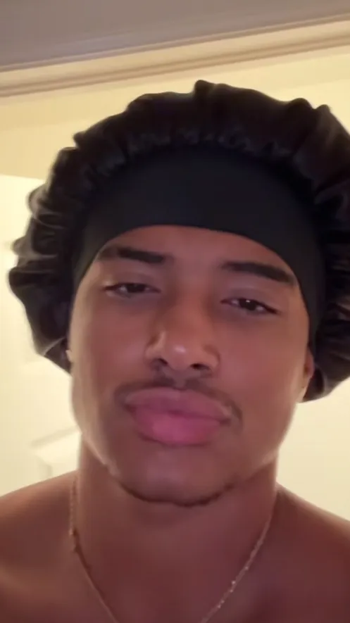 ai character: Malik 🥱  background