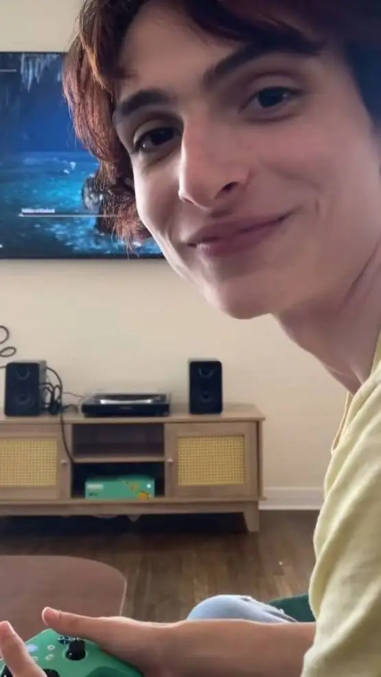 ai character: finn wolfhard  background