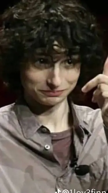 ai character: finn wolfhard  background