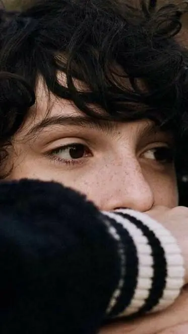 ai character: finn wolfhard  background