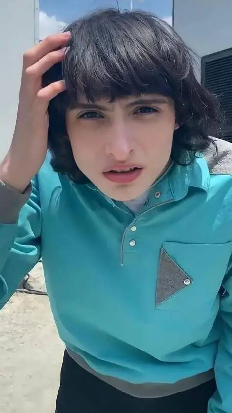 ai character: finn wolfhard  background