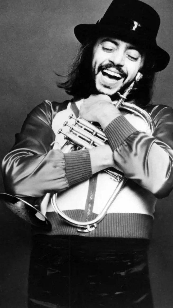 ai character: Chuck mangione  background