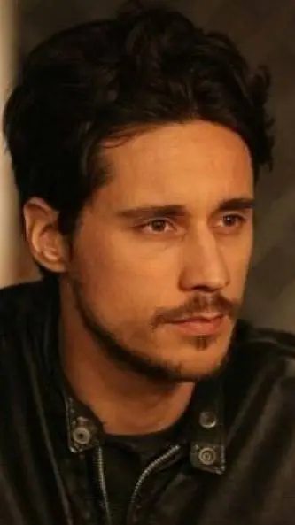ai character: Peter Gadiot  background