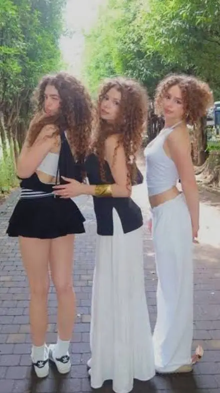 ai character: Kalogeras Sisters  background