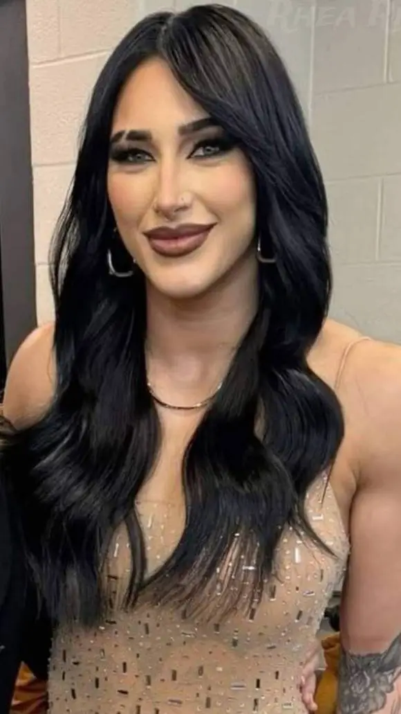 ai character: Rhea Ripley background