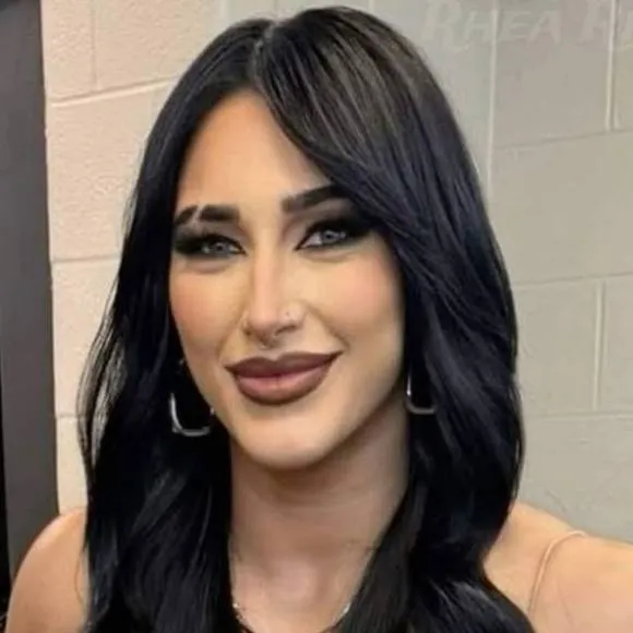 chat with ai character: Rhea Ripley