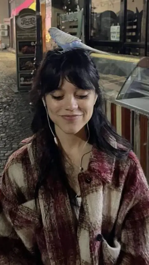 ai character: Jenna Ortega background