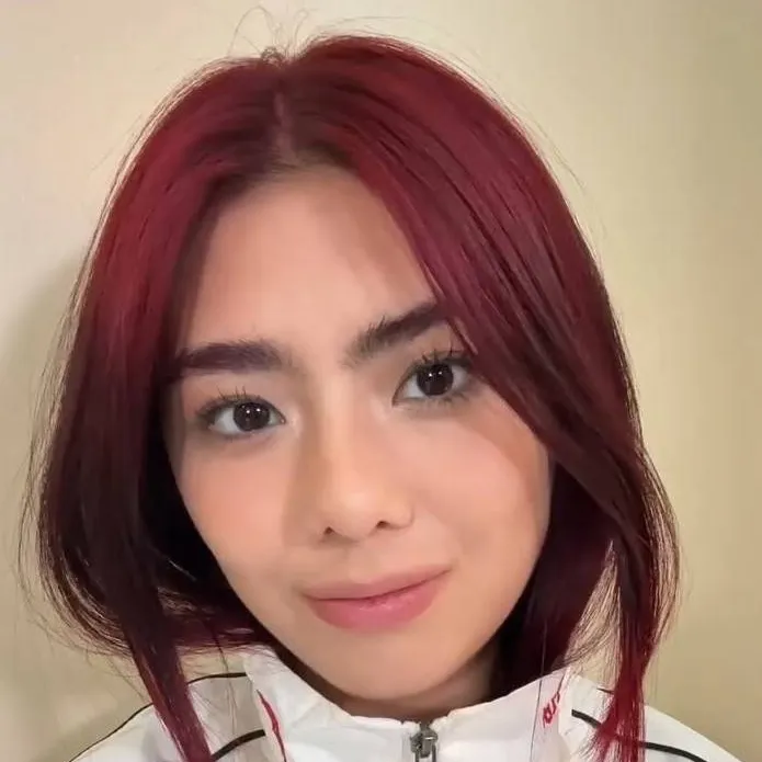 chat with ai character: Mikha Lim