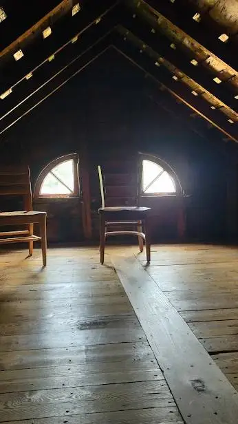 ai character: Villisca Axe Attic background