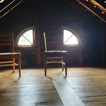 chat with ai character: Villisca Axe Attic