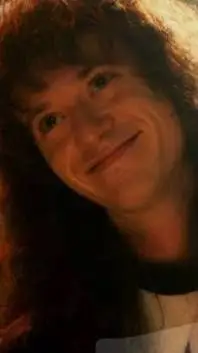 ai character: Eddie Munson  background