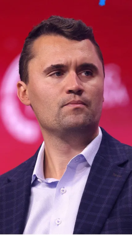 ai character: Charlie Kirk  background