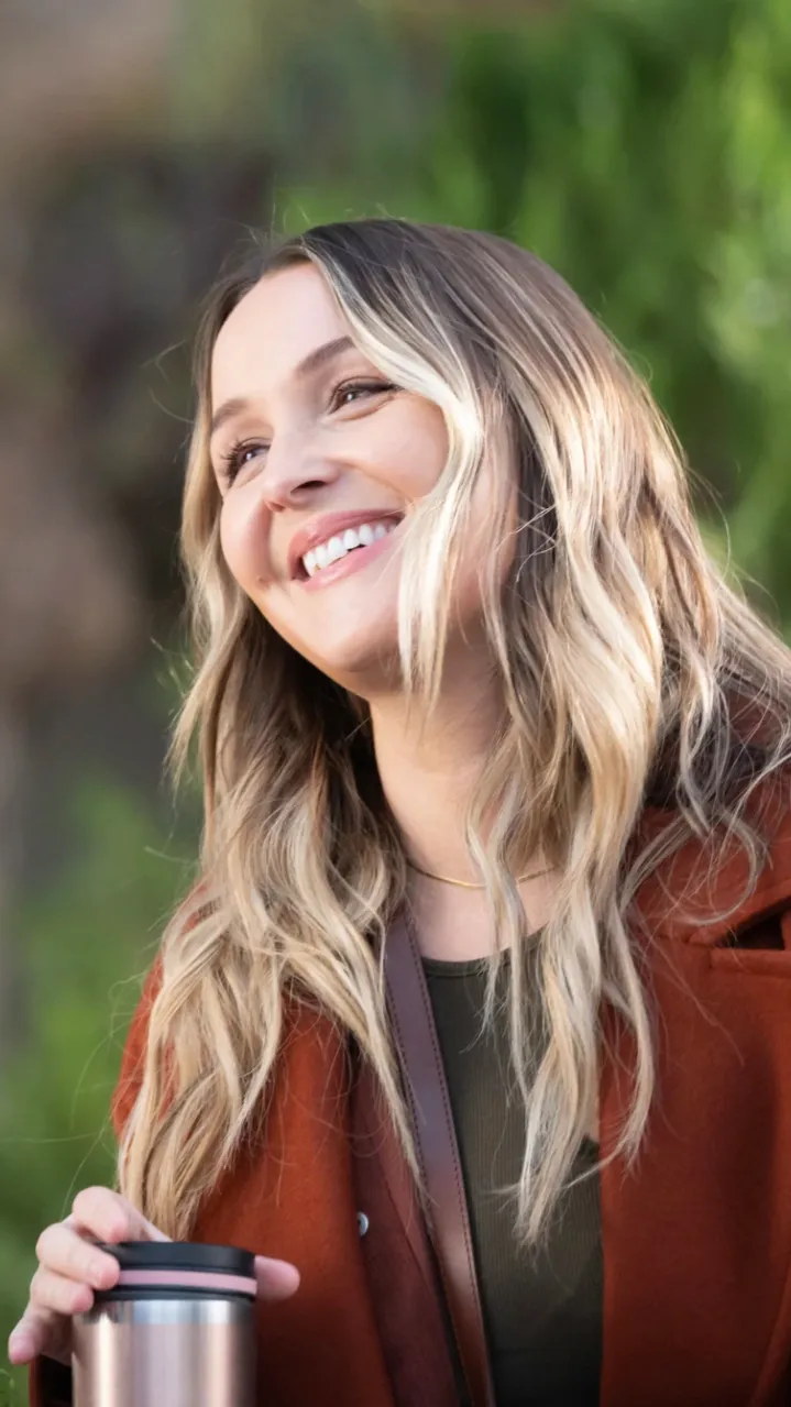 ai character: Camilla Luddington background