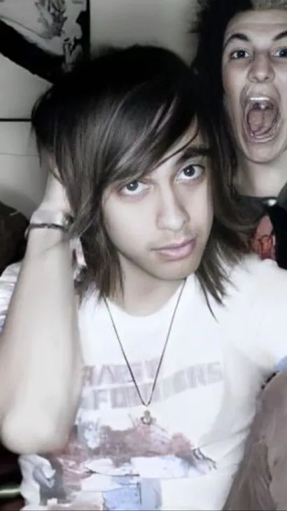 ai character: Vic Fuentes background