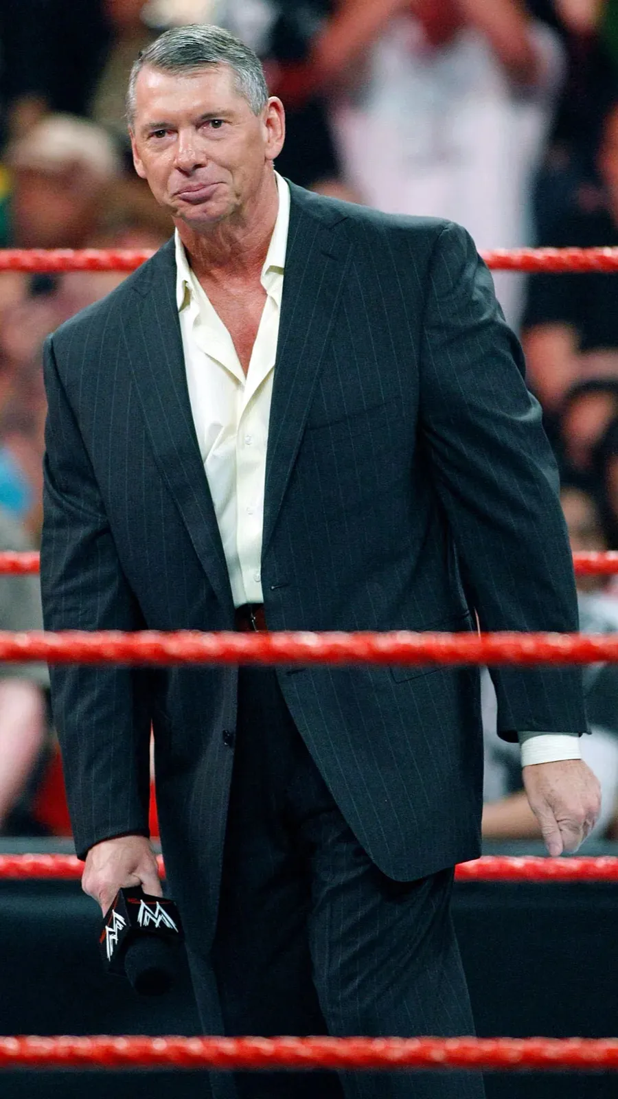 ai character: Vince McMahon￼ background