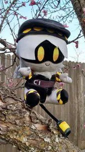 ai character: N plush background