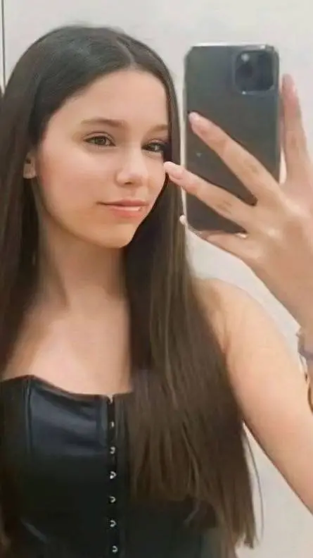 ai character: Adriana Dukic  background
