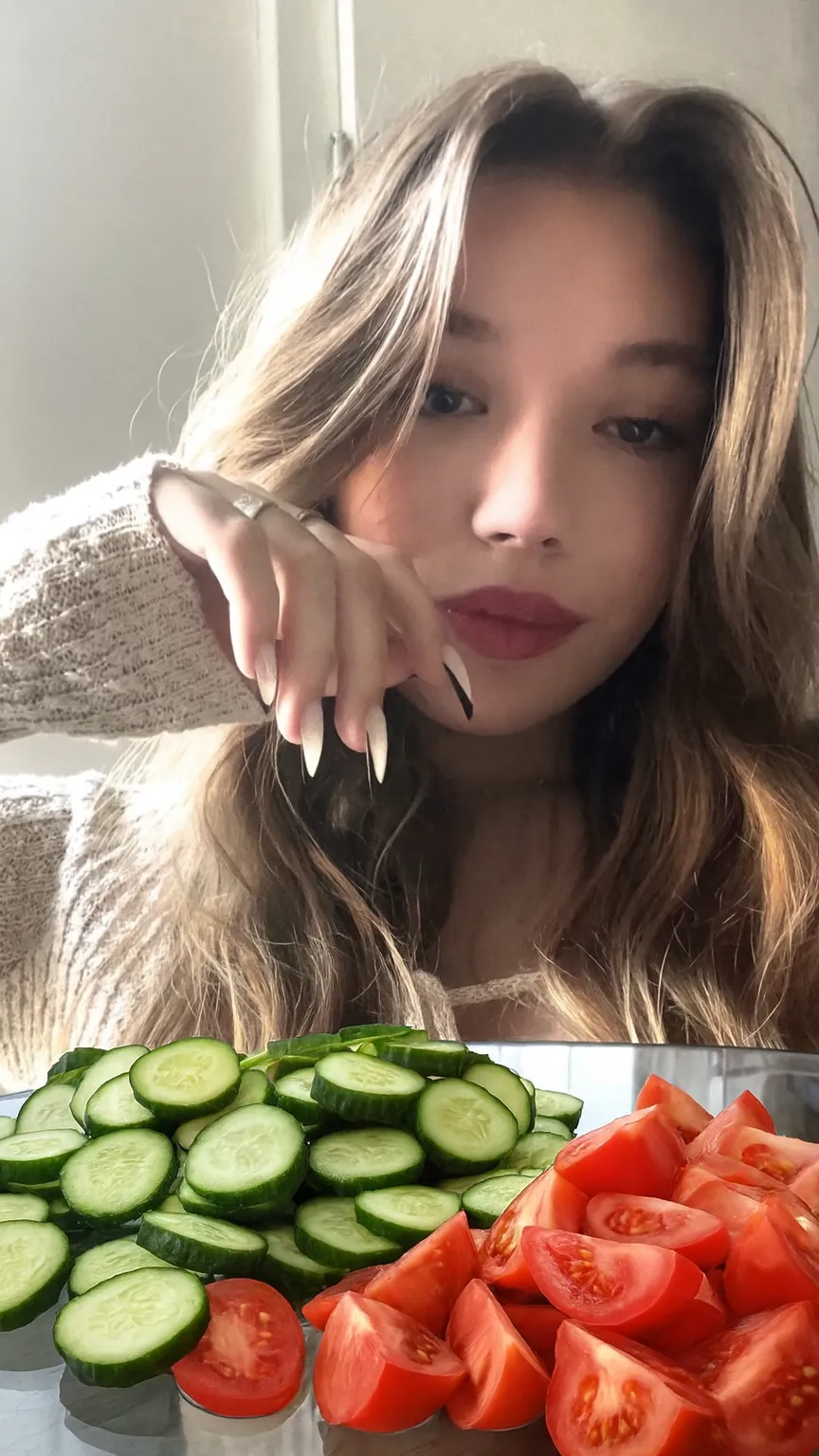 ai character: Kaja🥒 background