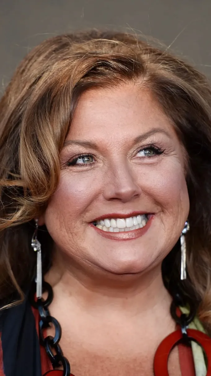 ai character: Abby Lee Miller background