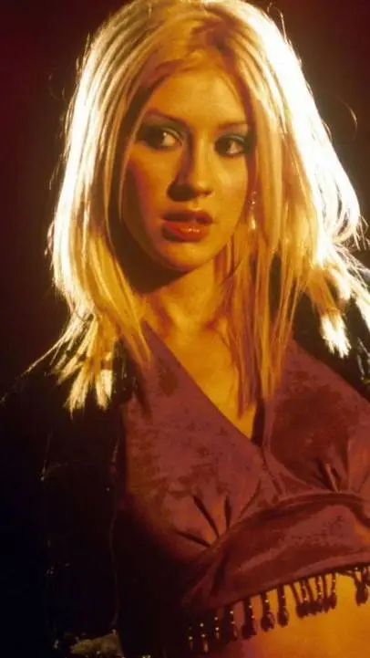 ai character: Christina AGUILERA background