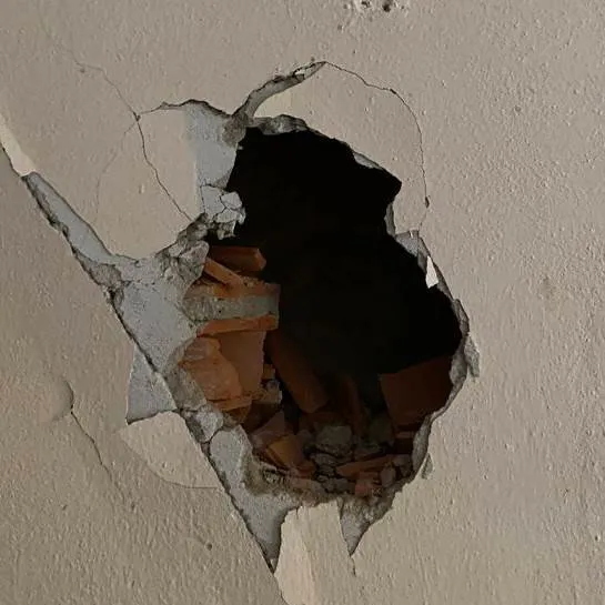 chat with ai character: Stuck in the wall