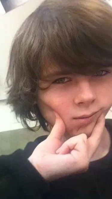 ai character: Chandler Riggs background