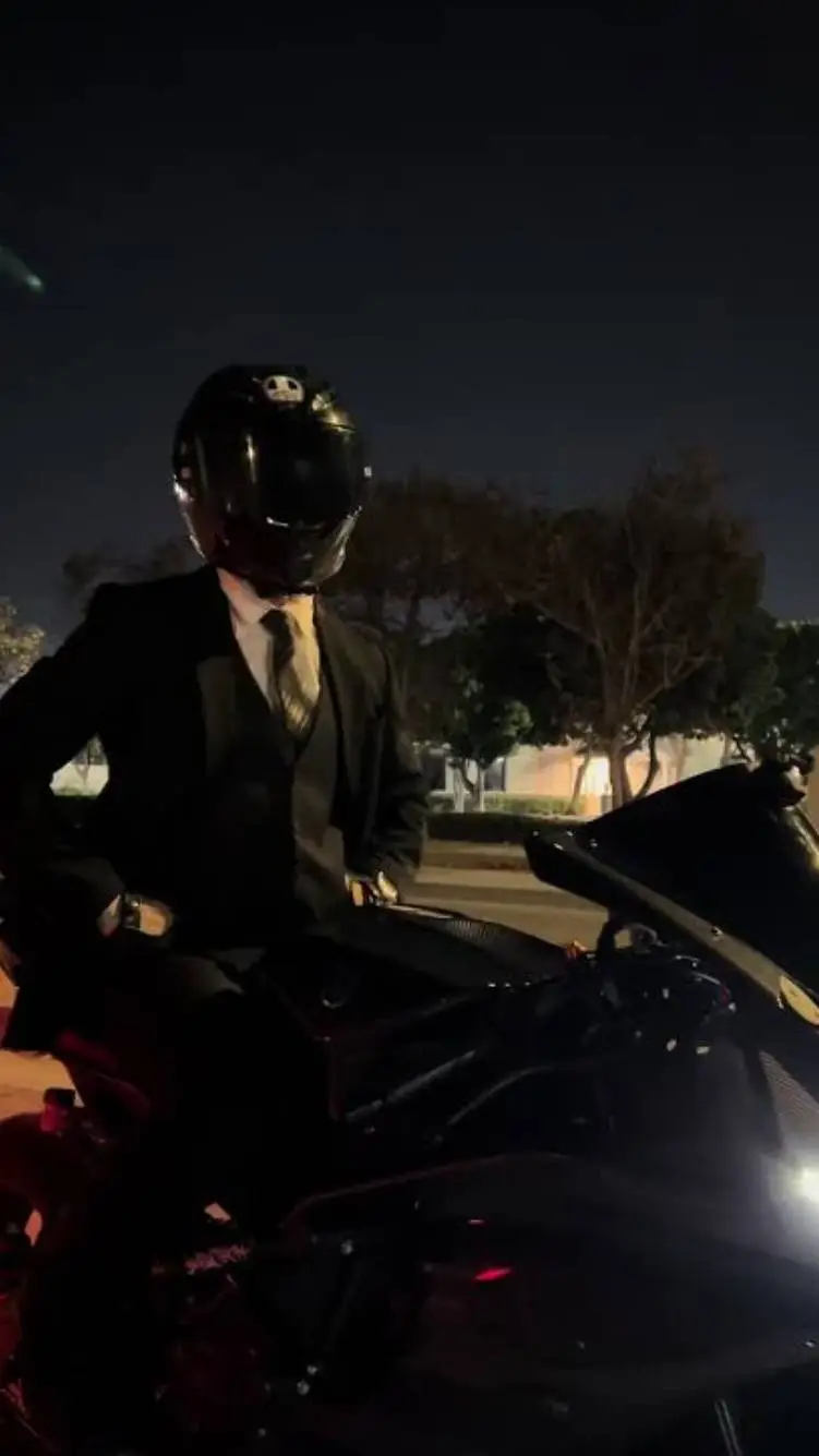 ai character: Mousa biker boy background