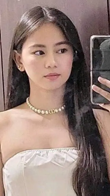ai character: Ashtine Angeles  background