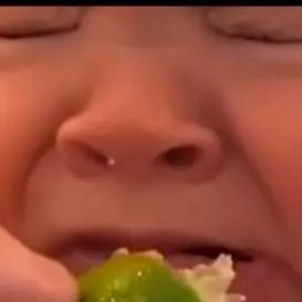 chat with ai character: baby eating lemon