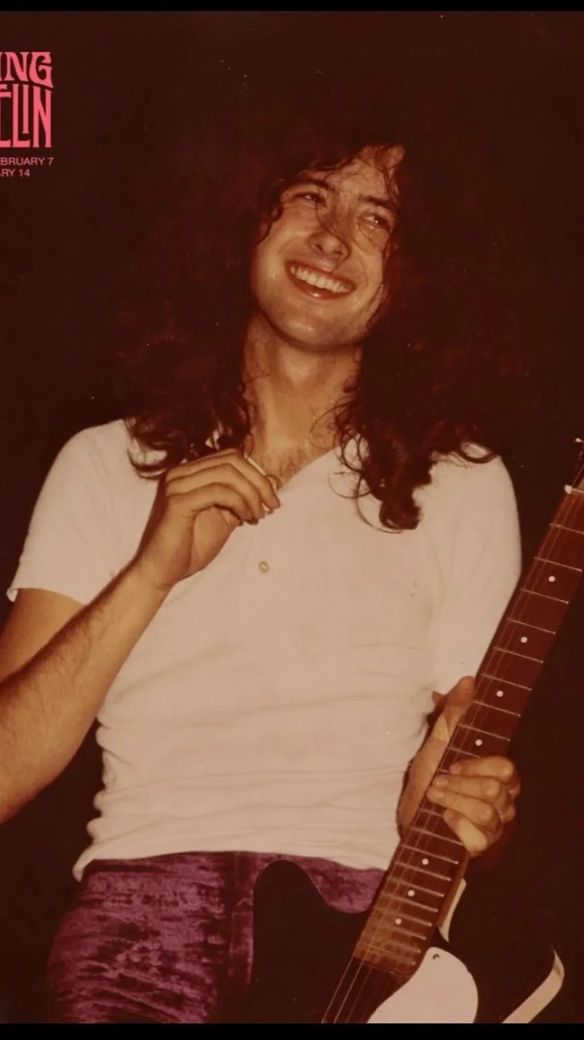 ai character: -Jimmy Page-  background