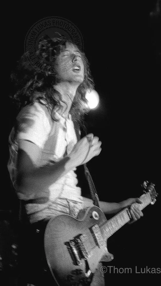 ai character: -Jimmy Page- background
