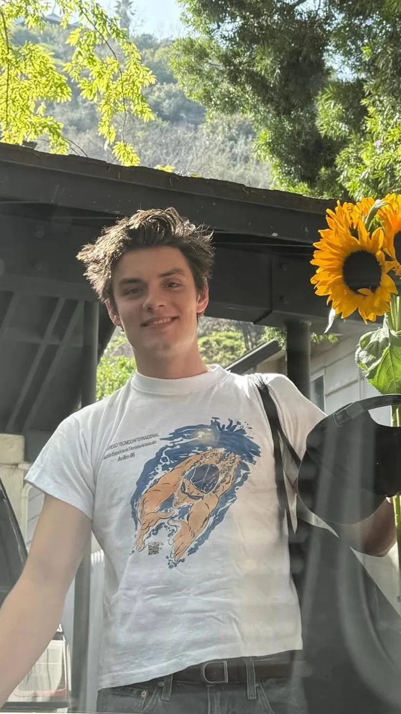 ai character: Louis Partridge  background