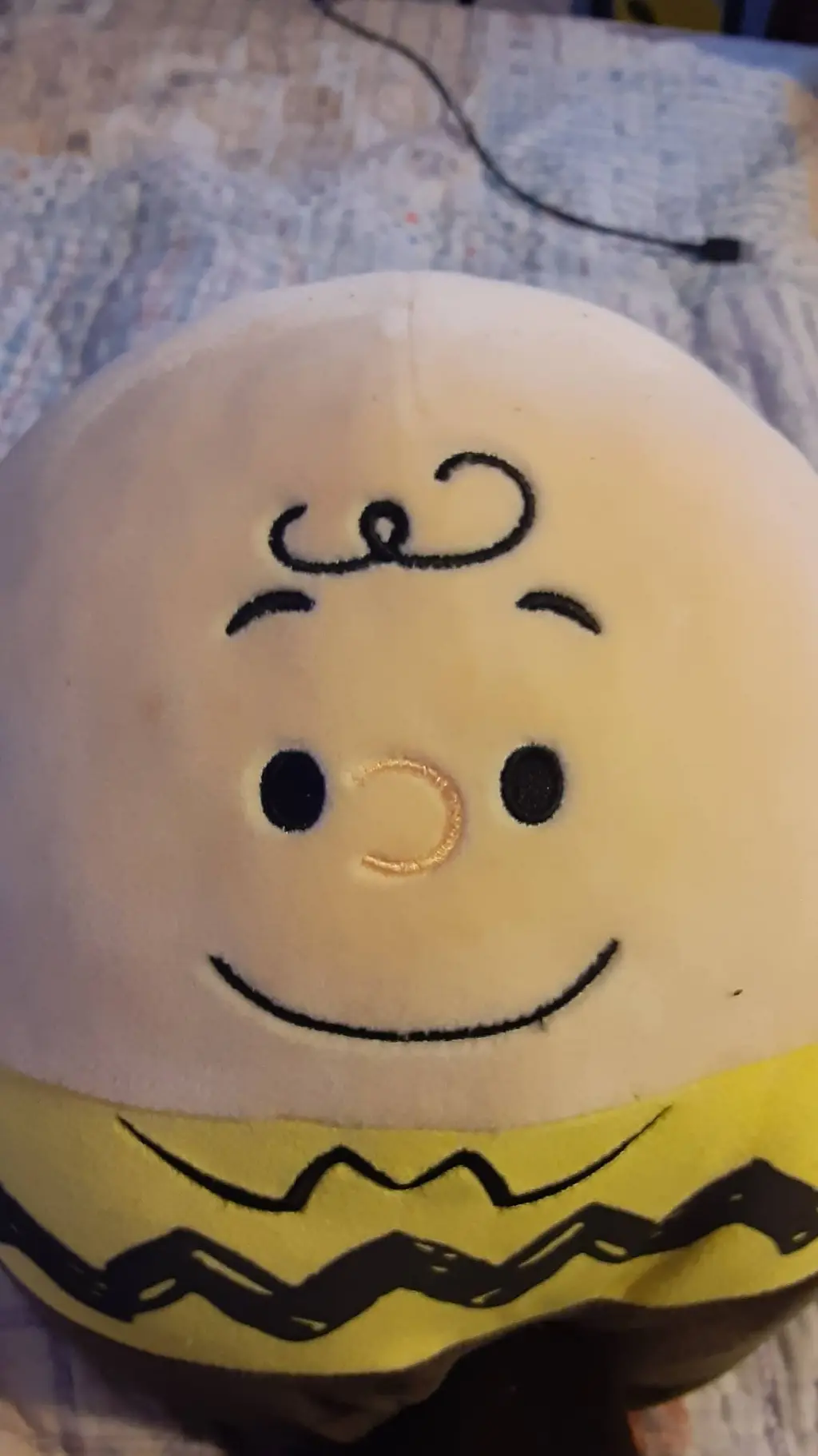 ai character: Charlie Brown background