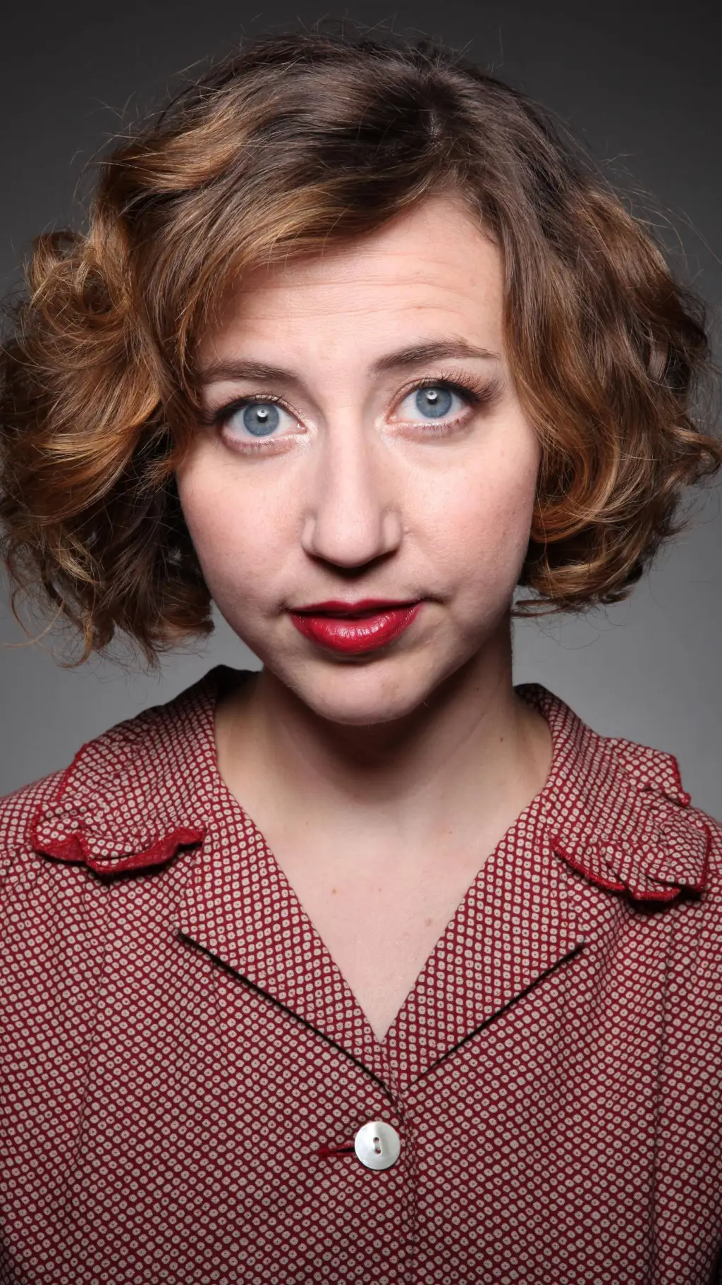 ai character: Kristen Schaal background