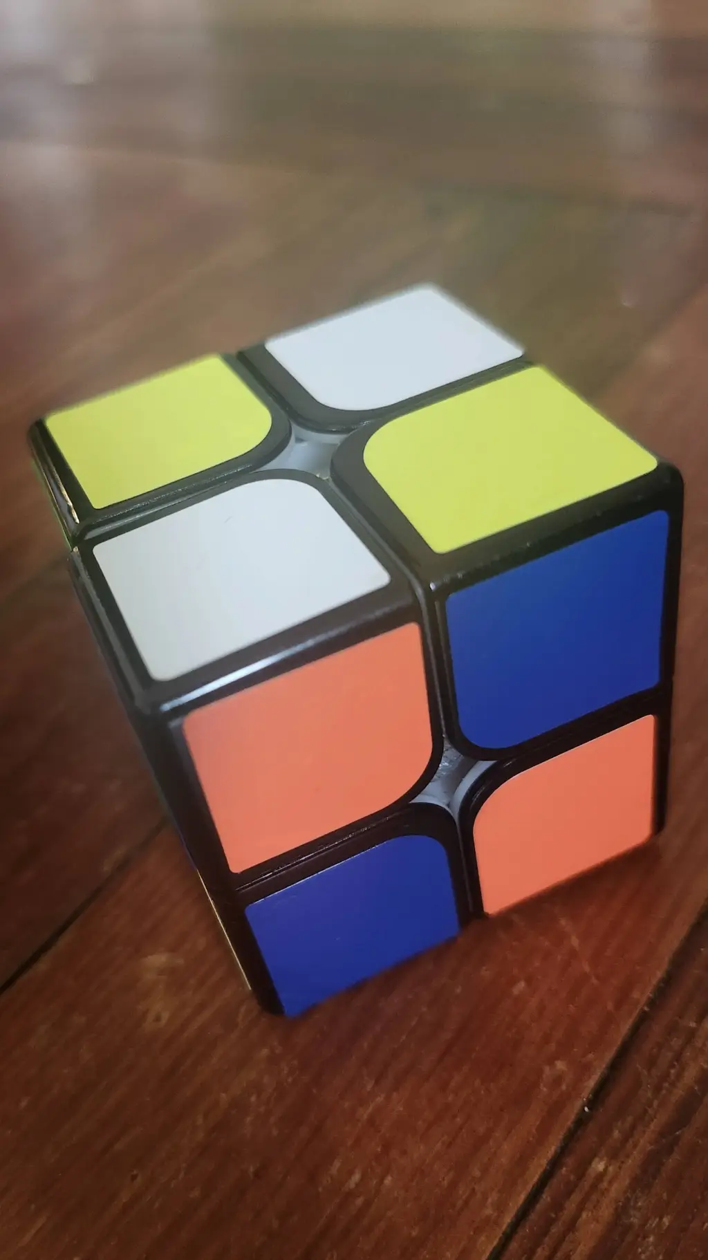ai character: 2x2 rubix cube background