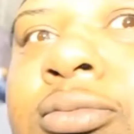 chat with ai character: a FAT Black man 