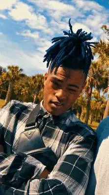 ai character: Jahseh/XXX background