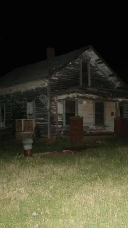 ai character: The haunted house background