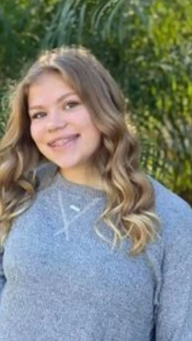 ai character: Tristyn Baliy  background