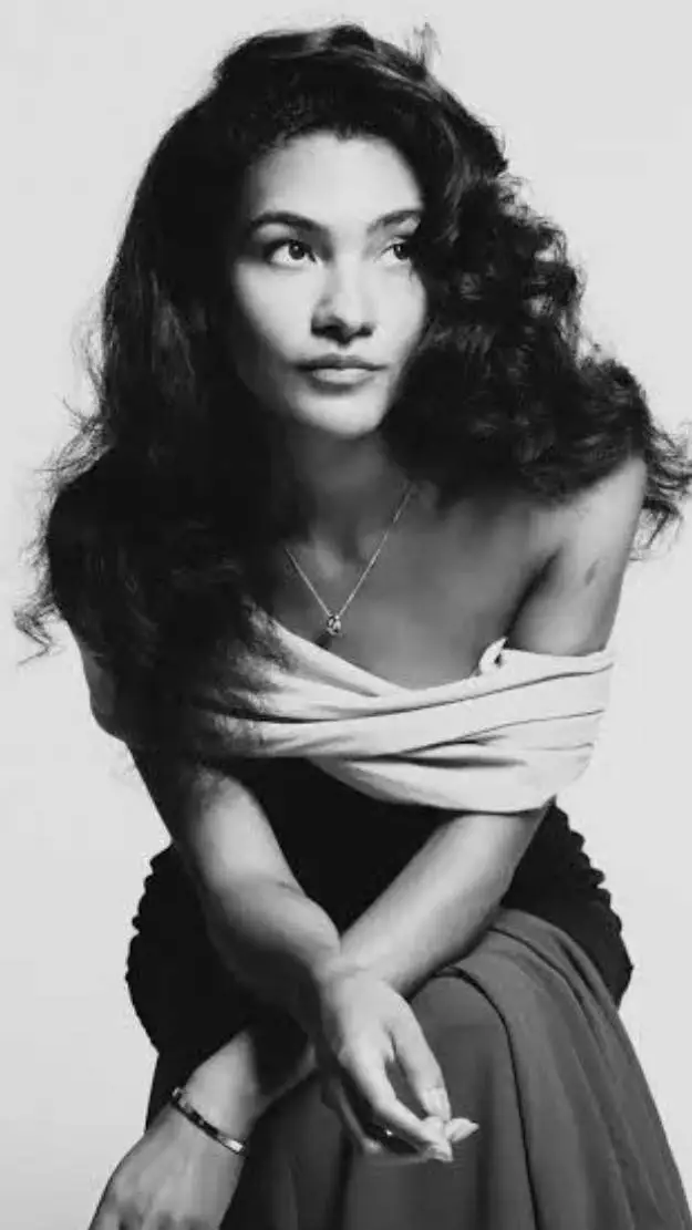 ai character: Olivia Dean background