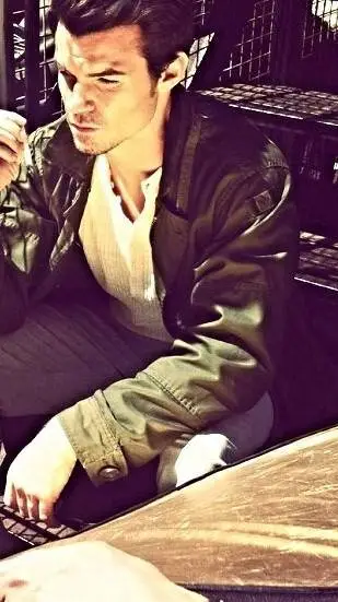 ai character: Daniel Gillies  background
