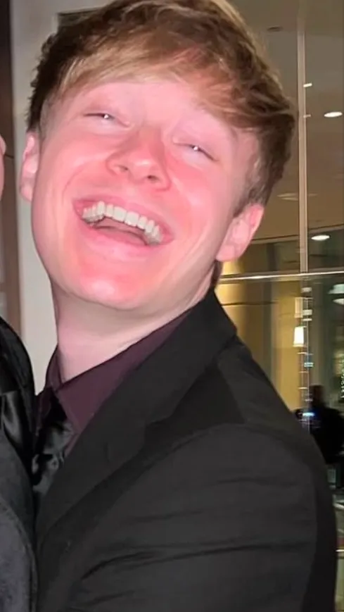 ai character: Sam golbach  background