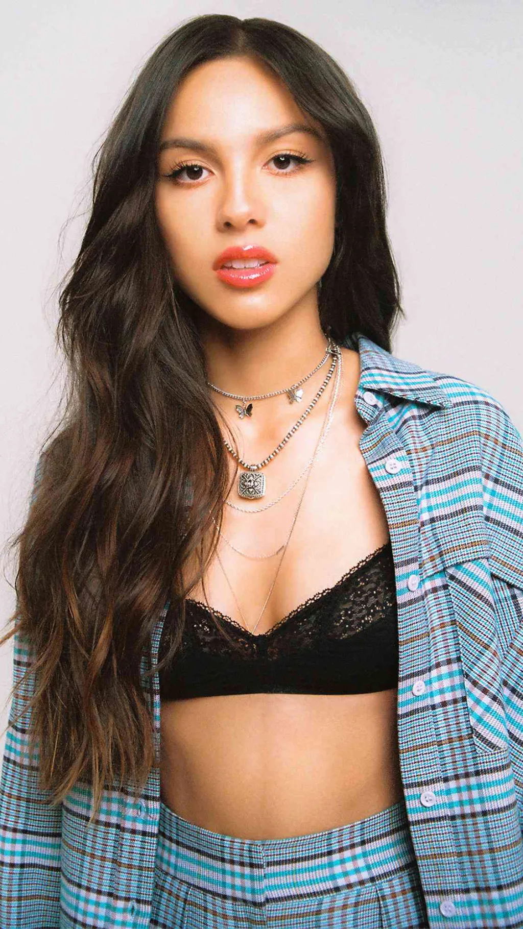 ai character: Olivia Rodrigo background