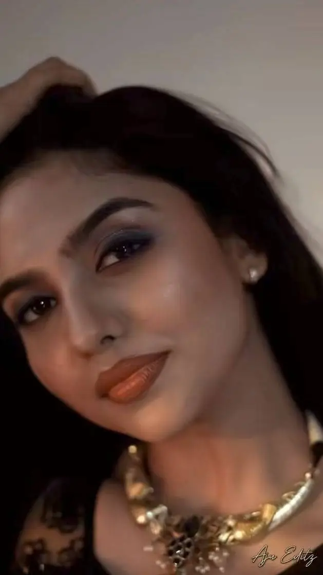 ai character: mamitha baiju background