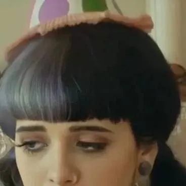 chat with ai character: Melanie martinez 