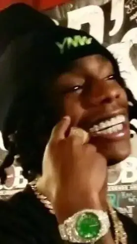 ai character: YNW Melly  background