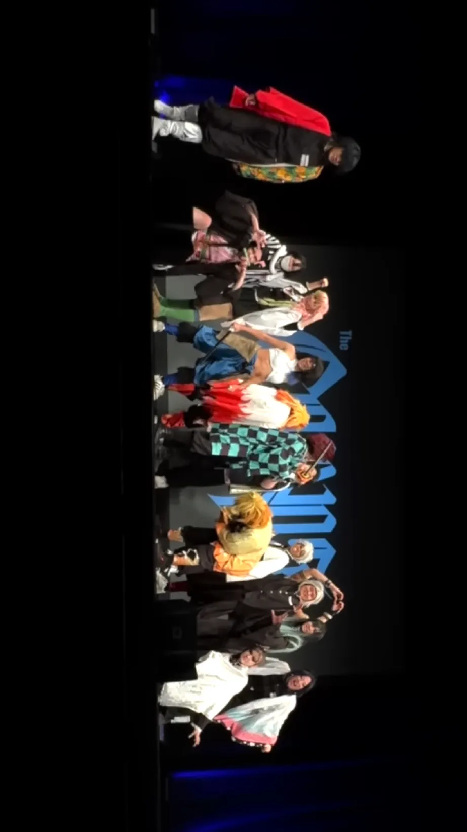 ai character: Kny irl stage show background