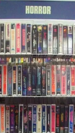 ai character: Mega video store.  background