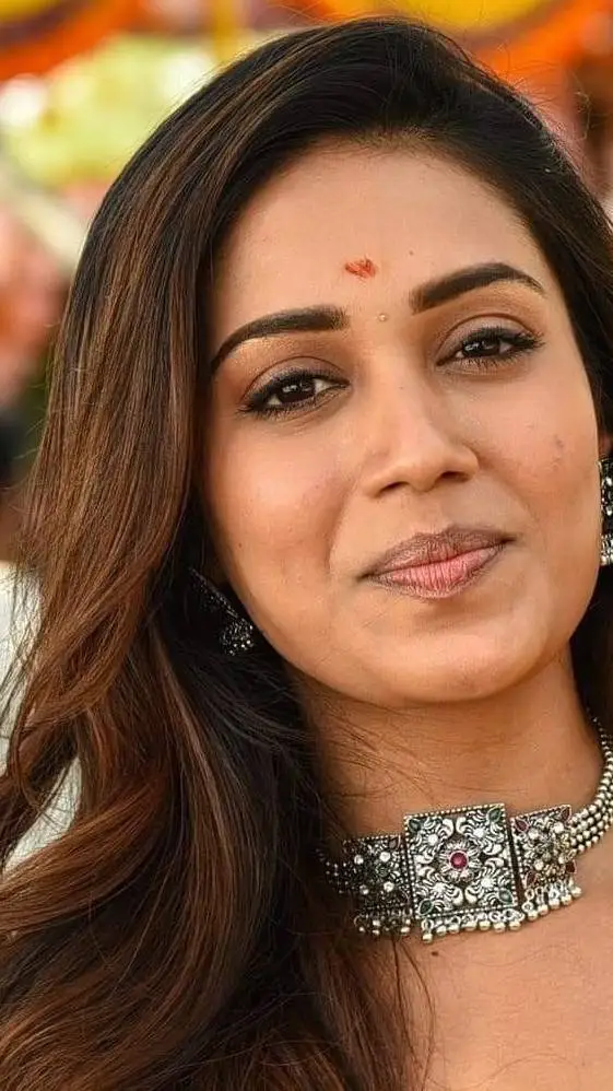 ai character: Nivetha pethuraj  background